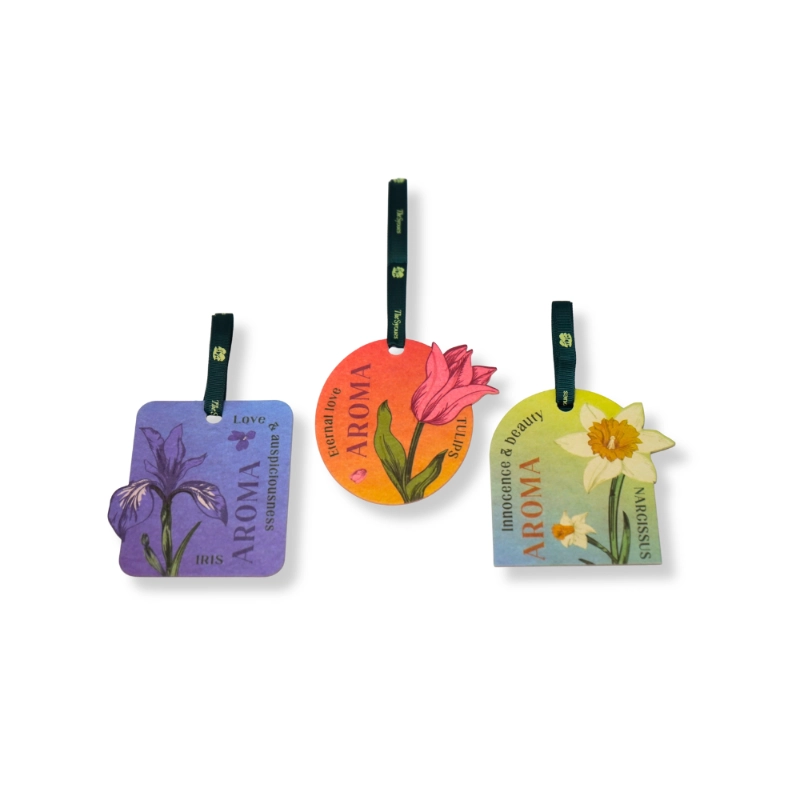 Set of three car air fresheners in Freesia, Vanilla Rose, and Peach Osmanthus scents