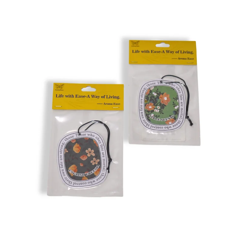 Floral paper car air freshener in retail vacuum packaging – AromaEase front view