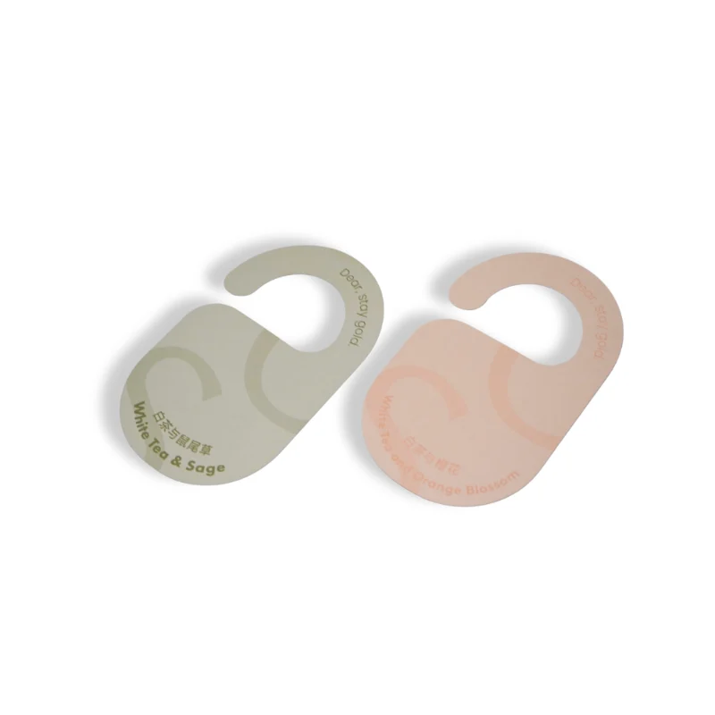 Minimalist hotel door hanger air freshener in white tea and sage scent