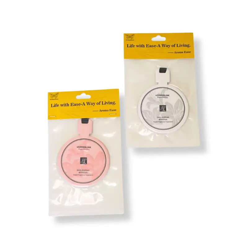 English Pear & Freesia orange air freshener packaged in retail hanging bags
