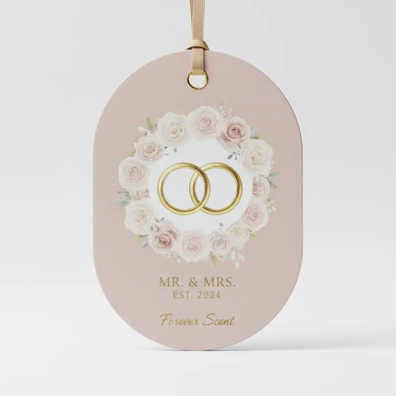 Pink and gold heart-shaped wedding air freshener with Forever Begins Today