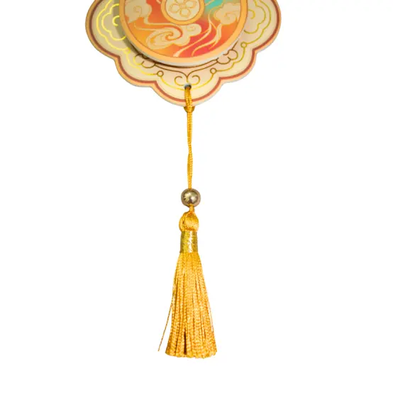 Orange tassel and decorative cord on Chinese hanging air freshener