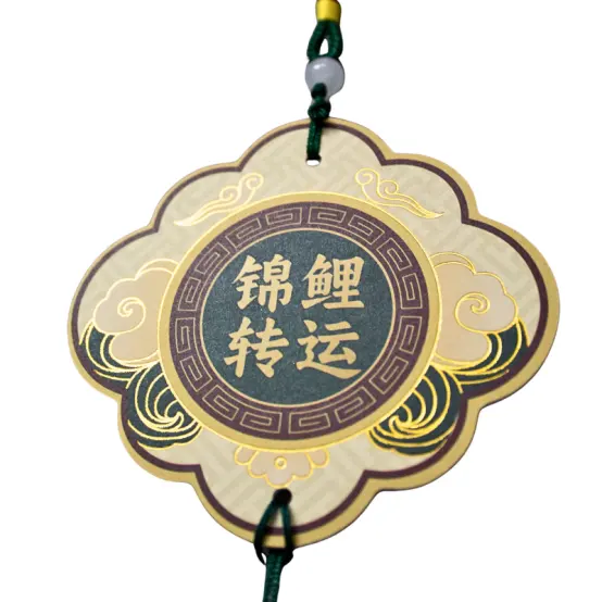 Gold foil reverse side of koi fragrance card with Chinese characters
